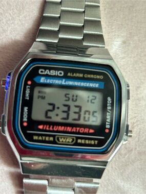 Casio Silver Digital Watch with Black and Blue Accents